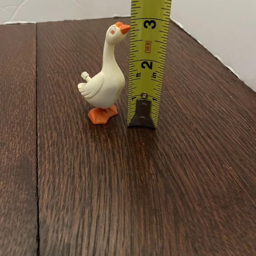 Vintage TOMY 1977 White Duck Pink Eyes Wind Up Toy Pocket Collectible Walks
